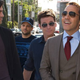The real guys of Entourage walking and not using Twitter, like real guys do.